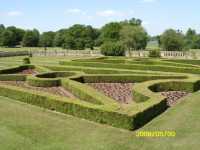 View of the formal gardens at the front of North Mimms Mansion